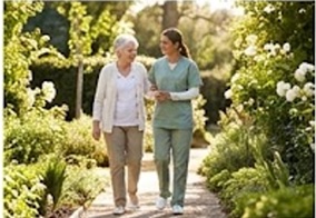 Indian physiotherapist guiding a patient through home exercises while a family member observes